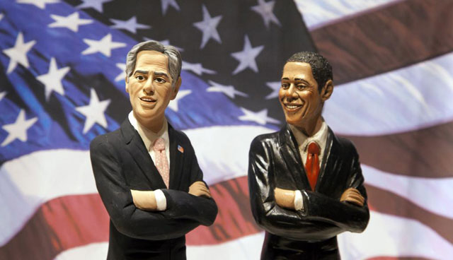 Figurines de los candidatos Romney y Obama.| Afp