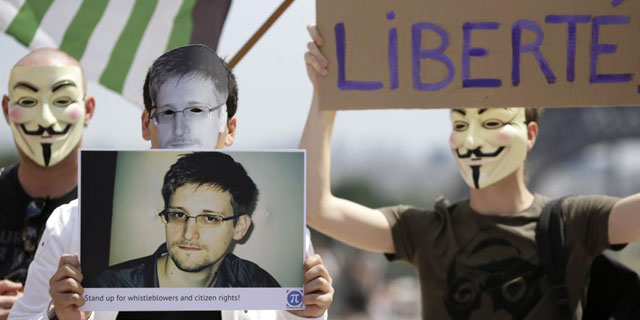 Manifestantes piden la libertad de Snowden. | Afp