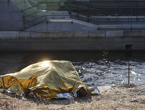 Imagen del cadáver hallado ayer en el río. (González) Imagen del cadáver hallado ayer en el río. (González)