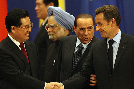 Hu Jintao, Berlusconi y Sarkozy. | Ap