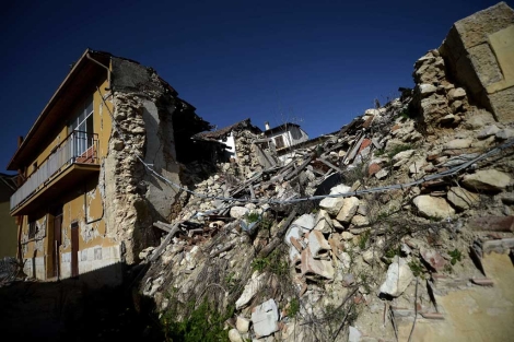 Daños provocados por el terremoto de L'Aquila. | AFP