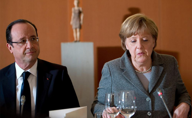 La canciller alemana, Angela Merkel (d) y el presidente de Francia, François Hollande. | Efe
