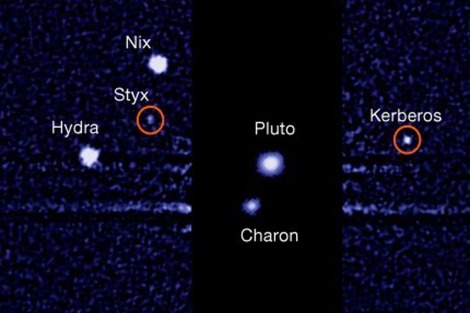 Las nuevas lunas de Plutón (señaladas con círculos rojos). | NASA