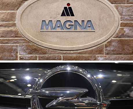 El logo de Magna y la insignia de Opel en un vehículo de la marca alemana. | AFP