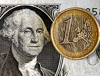 Los iconos del d�lar y la moneda europea, frente a frente. / AP